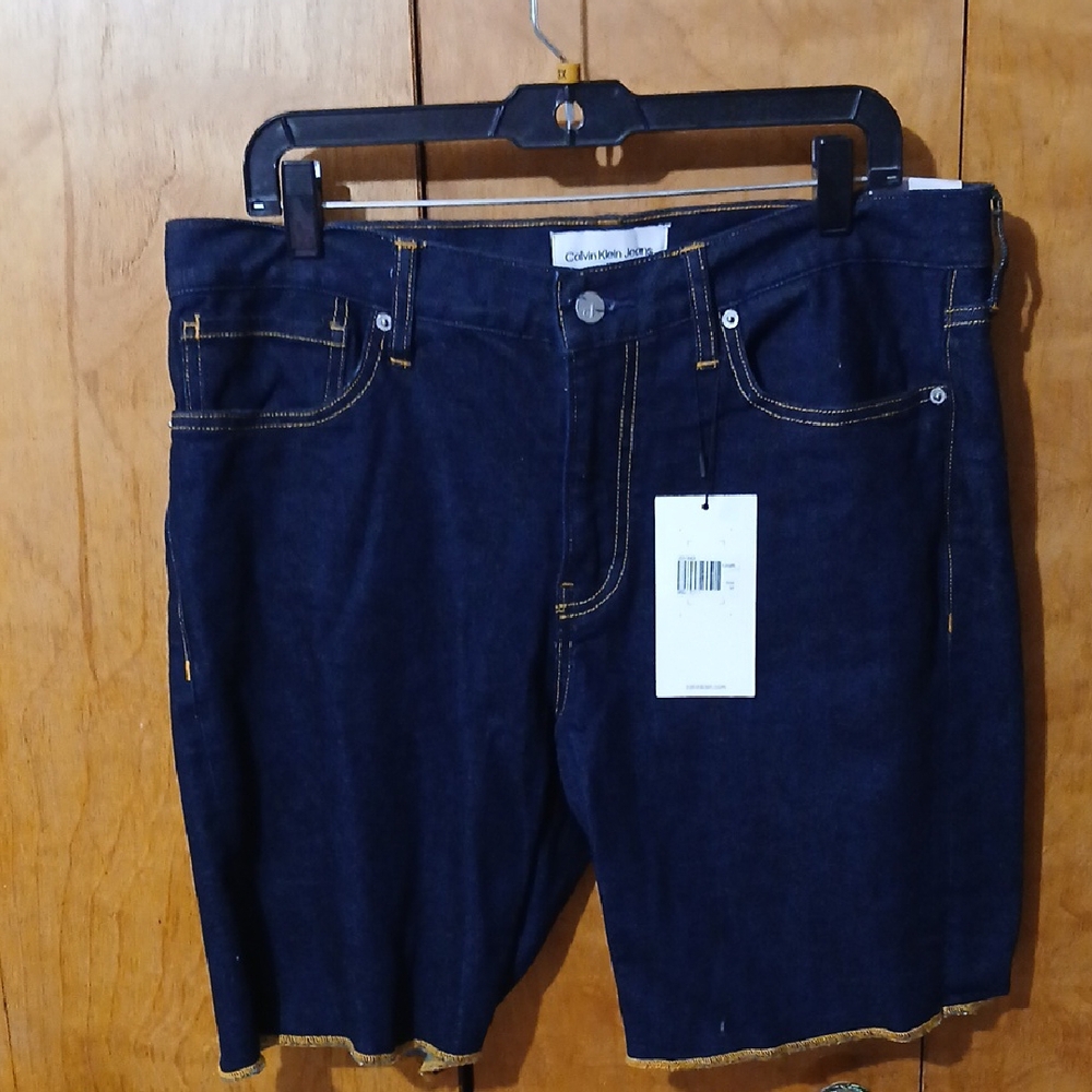 Calvin Klein Navy Denim Shorts with Yellow Stitching - Picture 4 of 11